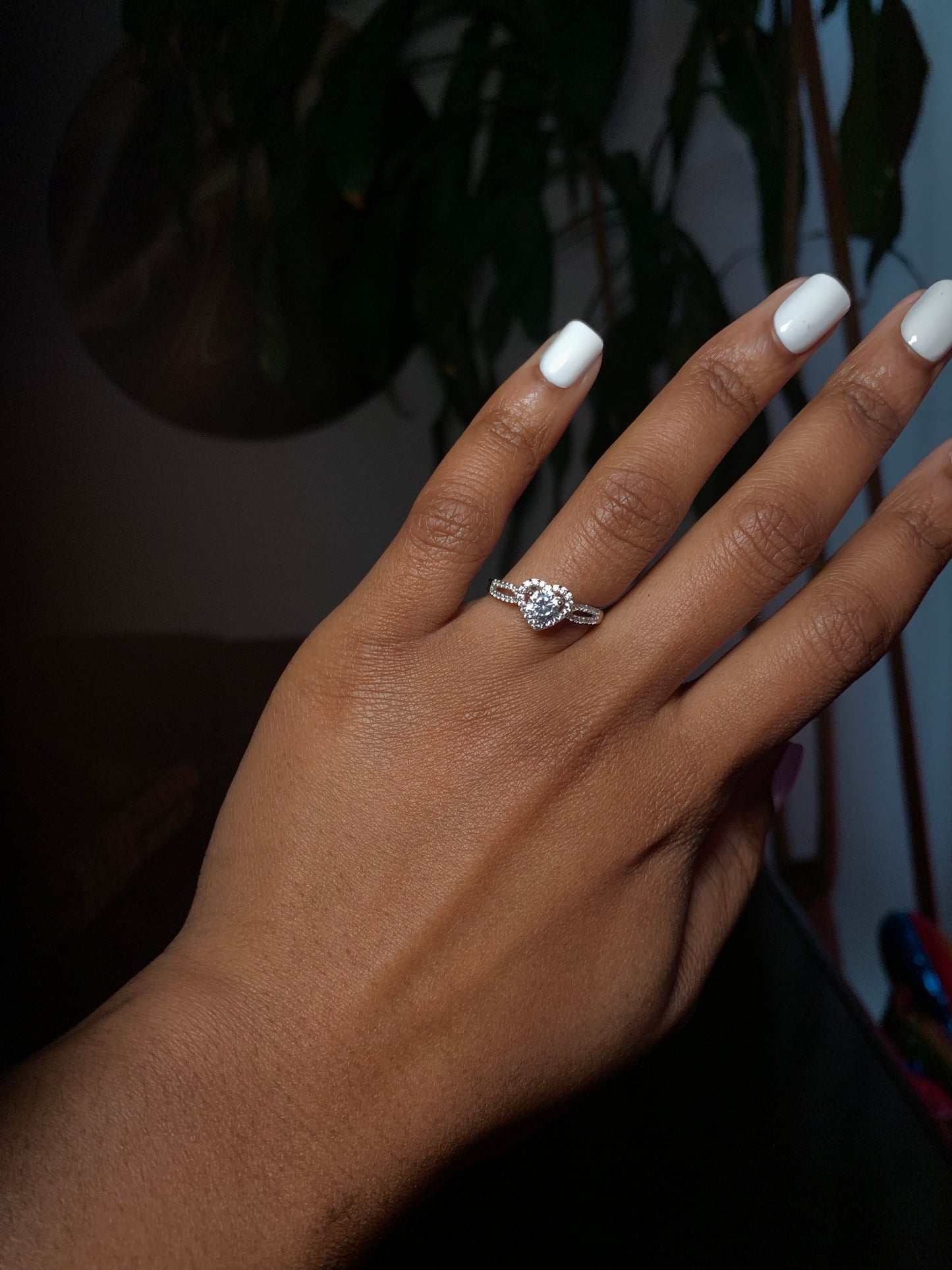 Silver heart shaped Moissanite timeless ring for women glistens in natural and sun light