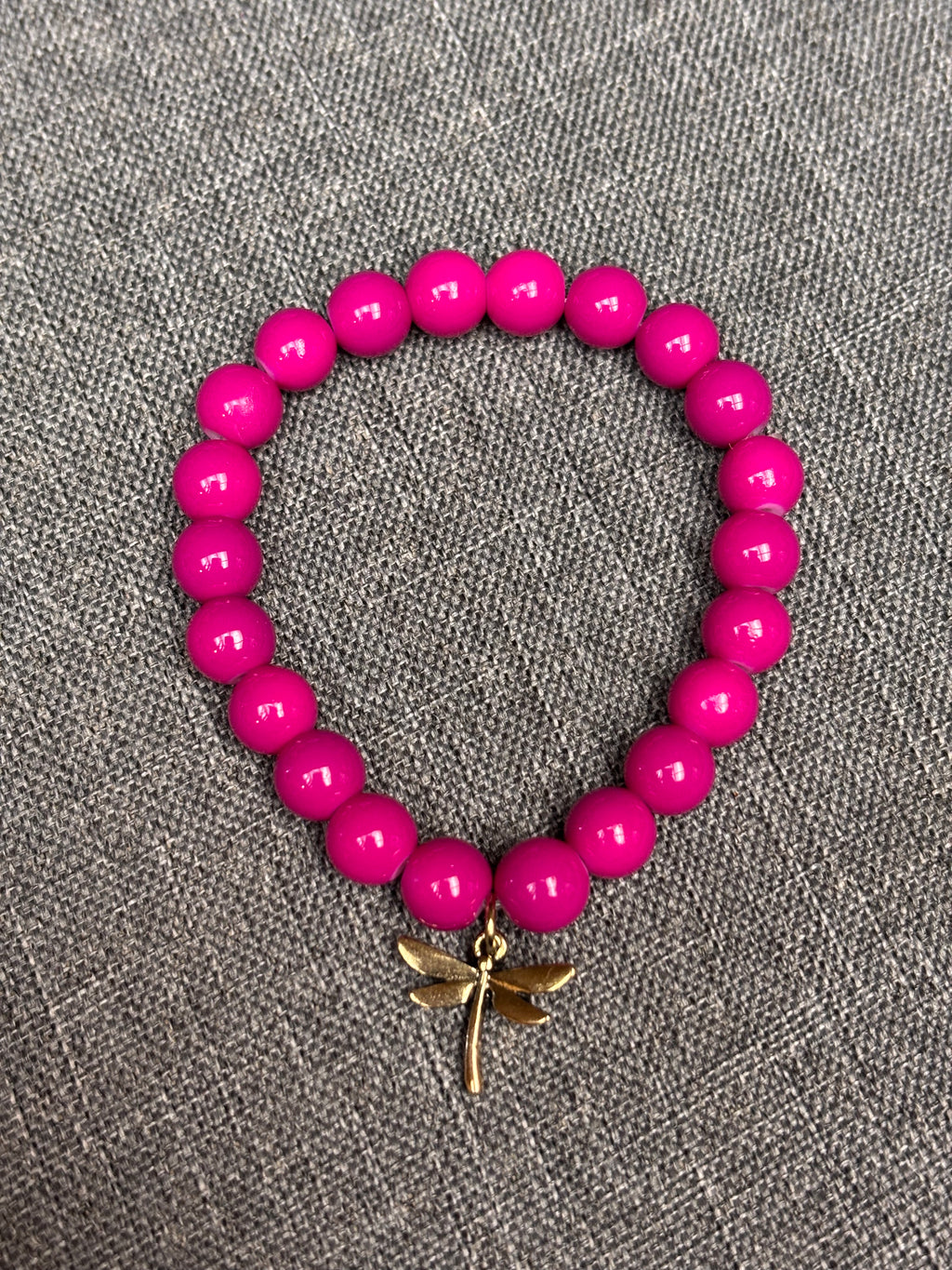 Magenta beaded dragon fly bracelet