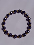 Purple 6mm pearl colored bracelet