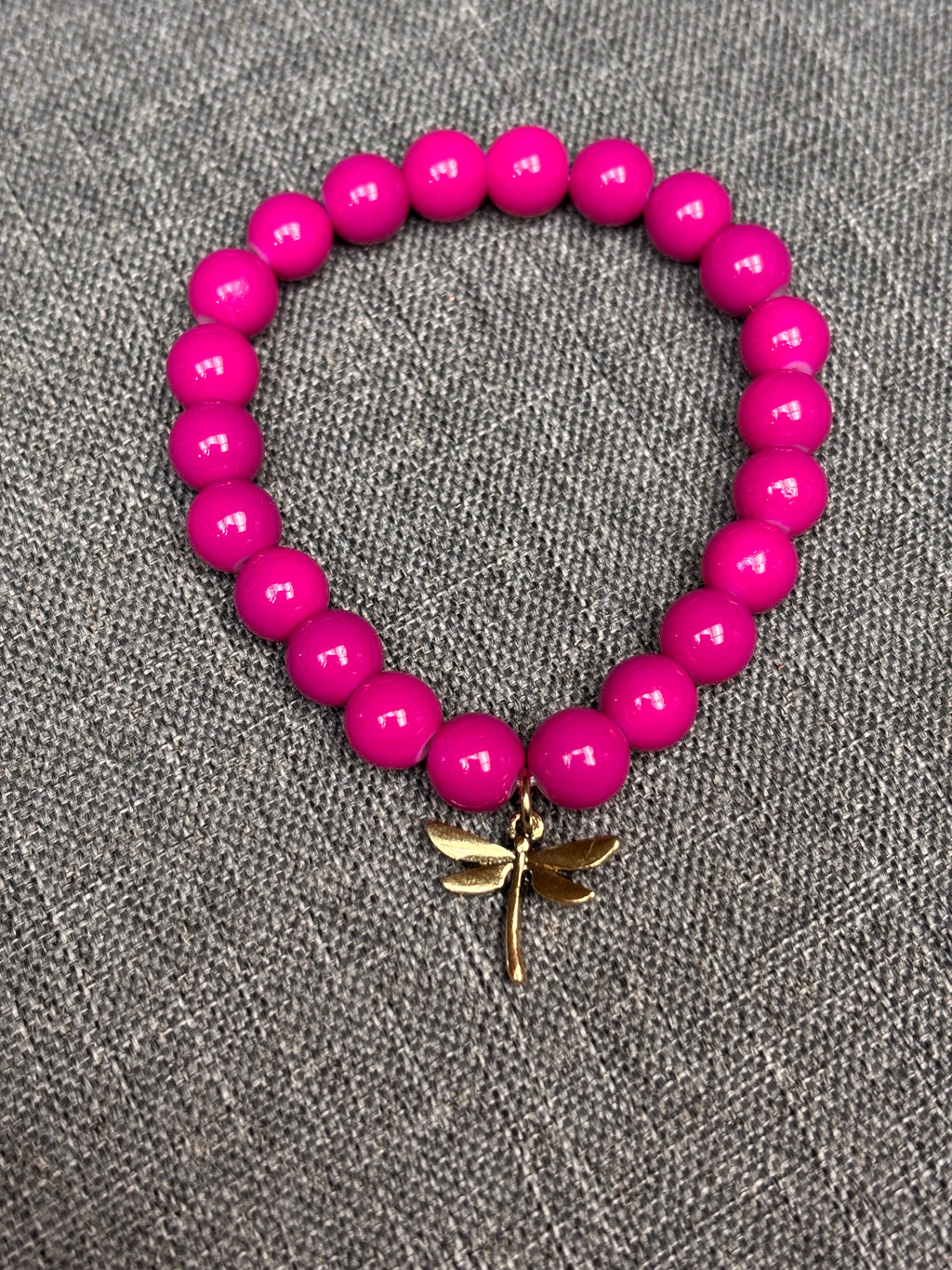 Magenta beaded dragon fly bracelet